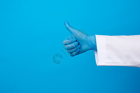 身着白大衣 穿着蓝色医用乳胶手套医生医师医院手指信号手势保健诊所专家卫生图片