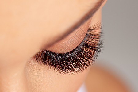 长眼妇女眼 眼睛延伸 美丽的拉斯岛皮肤头发程序睫毛治疗女士化妆品黑色女性图片
