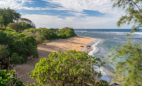 卡瓦伊东海岸的拉森海滩海洋冲浪旅行海浪天堂海滩荒野土地海岸热带图片