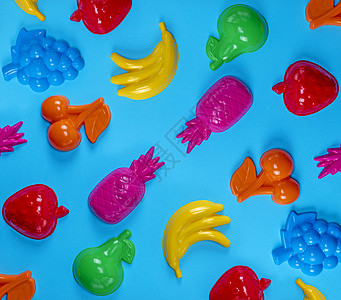 蓝色背景 有儿童多彩玩具童年橙子黄色食物粉色喜悦凤梨乐趣水果绿色图片