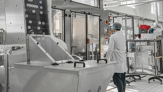 牛奶厂的设备奶制品盖子机器商业工厂加工食物技术外套饮料图片
