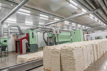 纺织厂的打卡机织机加工梳理作坊梳理机制造业纤维丝绸纺纱机器图片
