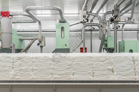 纺织厂的打卡机纺纱翘曲绿色编织作坊纺织品梳理丝绸生产工厂图片