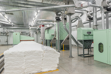 纺织厂的打卡机丝绸梳理白色绿色机械翘曲材料技术织机梳理机图片