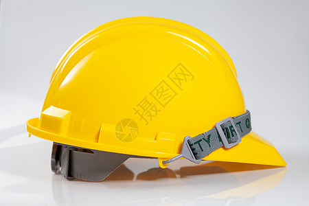 就业难素材白色背景的黄色安全头盔 Hard Hat 或 safe eng帽子头盔安全帽员工商业危险工程师安全技术员预防背景