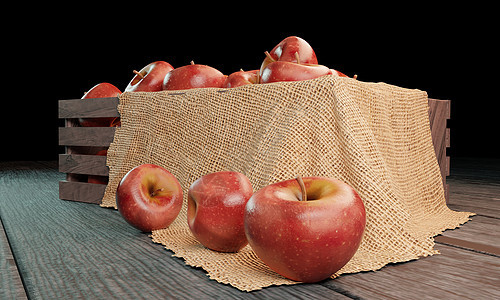 木箱中的红苹果 木质表面有 Hessian 织物营养木头饮食食物水果解雇收成篮子花园小吃图片