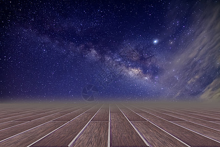 夜间银河天边木质地板和背景天文学黑色蓝色乳白色场地星星宇宙科学墙纸星系图片