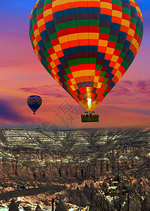 热气球降落在卡帕多西亚戈雷梅部落山上a追求竞赛运动地形冒险天空场地火焰航班篮子图片