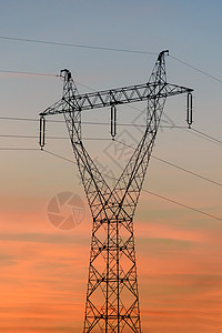 烧塔日落时特写电平和电线力量电缆环境金属发电机植物车站天空工程橙子背景