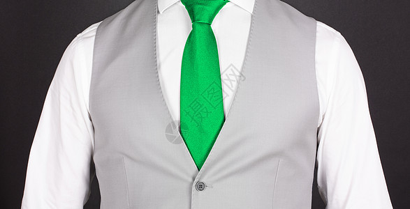 穿灰色西装的人 特写商业蓝色男士身份人士黑色绿色领带男人金融图片