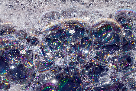 背景的沐浴水泡沫泡沫的特写液体圆圈水滴星系洗发水天空气泡星星宇宙彩虹图片