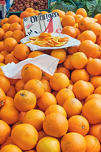 供在市场上销售的坦吉林食物团体水果叶子橙子水果商饮食盘子杂货店店铺图片