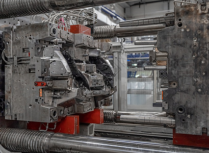 工厂中用于汽车工业的塑料铸件的金属压力机 工业 4 0汽车工具机器制造业安全机械冲压机作坊生产力量图片