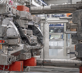 工厂中用于汽车工业的塑料铸件的金属压力机 工业 4 0数控管子投掷冲压机制造业工具汽车注射机器模具图片