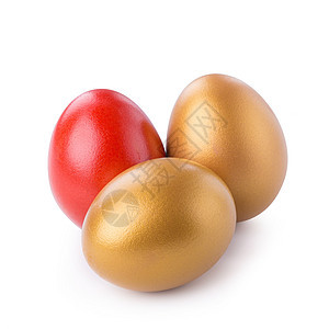 金蛋和红蛋在白色背景上被孤立成功金属金子金融奢华黄色宝石财富储蓄宝藏图片