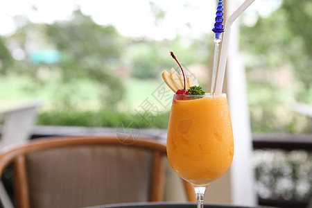 橙汁宏观假期玻璃饮食桌子叶子热带矿物质食物木头图片