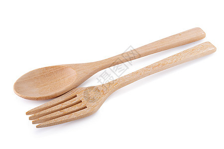 在白色背景上被隔离的木勺和木叉棉布竹子家庭国家食物钢包文化木头烹饪工具图片