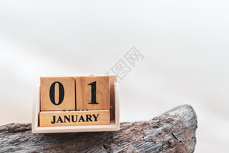 木砖块显示 1 月 1 日或元旦的日期和月历假期日记数字生日框架工作办公室庆典日历白色图片