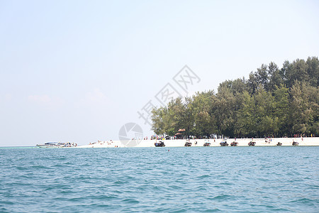 海滩上的热带日落 泰国克拉比反射假期紫色天气旅行太阳海洋岩石天空海浪图片