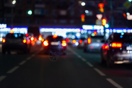 从路边看 夜车交通的景象不集中 生活背景五花八门沥青圆圈盲目性墙纸街道蓝色辉光景观驾驶车辆图片