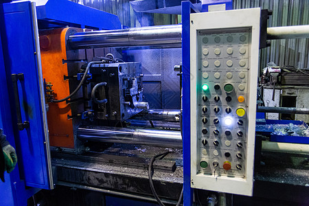旧水平式铝铸铝机     打开 有选择性重点的闭合金属店铺温度注射机器控制工厂压力控制板投掷图片