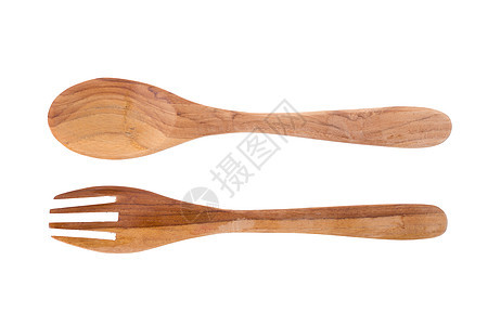 在白色背景上隔离的木制勺子和叉子木头用具文化食物材料烹饪厨具服务刀具时间图片