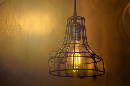 砖墙上的照明灯泡 b 在板墙上概念白炽灯枝形插座圆形收音机灯丝玻璃吊灯电线图片