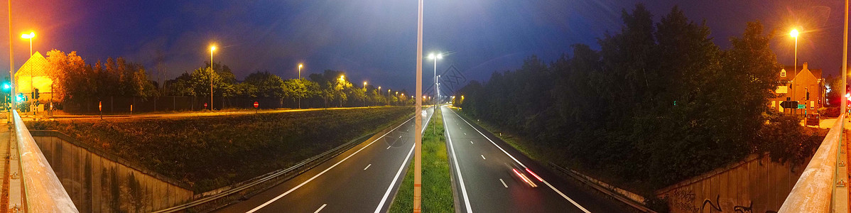 夜间在高速公路上运输驾驶汽车商业速度运动蓝色摩天大楼车辆旅行图片