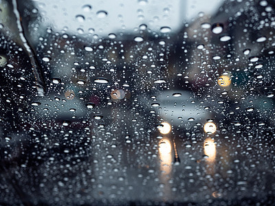 雨天的街道旅行蓝色汽车窗户挡风玻璃气候大灯风暴季节雨滴图片