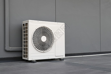 空调系统的冷凝装置 安装在灰色墙壁上的冷凝装置交换护发素冷却剂机器机械冷藏金属力量暖通状况图片