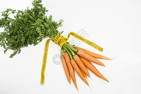 植物饮食减肥 新鲜采食的碳水化合物组织女士女性蔬菜食物身体卷尺数字损失磁带图片