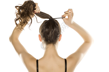 后面的女人 绑着她的头发尾巴小马成人领带黑发女孩发型女士女性图片