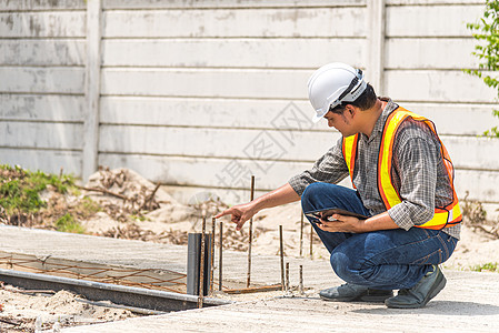 建筑工地的人力建筑工程师工作背心技术建筑师帽子职业成人头盔技术员商业图片