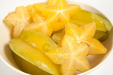 流星雨白色星星恒星水果或卡兰波拉食物黄色异国白色营养叶子工作室药品饮食星星背景