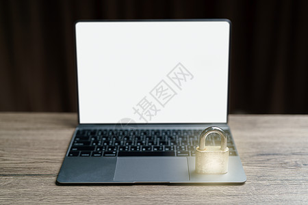 笔记本电脑上的黄金主锁密钥位置是锁定一个da的概念安全钥匙技术互联网键盘电子产品身份密码按钮代码图片