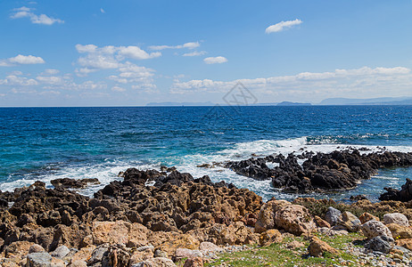 克里特人的光华玫瑰银行岩石天堂旅行支撑热带海浪海滩海岸图片