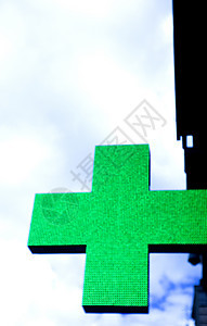 绿十字药店 没有人街道情况天空建筑化学家援助药品城市医疗绿色图片