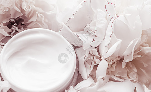 Luxe化妆品奶油罐 作为在小马花 体润湿剂和美容品牌背景上反皮肤护理常规产品花朵洗剂假期奢华美丽销售保湿玻尿酸面具广告图片