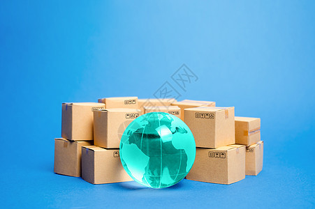 地球地球被盒子包围 货物产品的全球业务和国际运输 航运货运 世界贸易和经济 分销 进出口 商品成交额图片