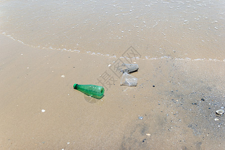 沙滩上垃圾 塑料瓶子和肮脏废物 停止使用塑料瓶子的  概念运动危险海洋泡沫生活环境热带生态回收国家海岸图片