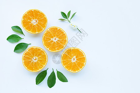 高维生素C 橙色水果和白底的叶子早餐桌面饮食皮肤排毒桌子植物甜点营养橙子图片