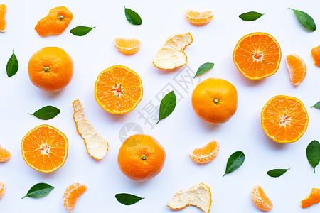 带果皮和绿叶的鲜橙柑橘类水果图片