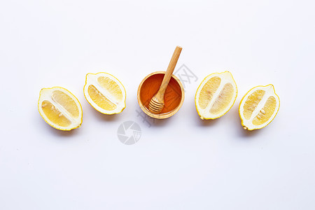 含柠檬的蜂蜜在白色背景叶子圆圈生长果汁热带框架橙子饮食水果团体图片