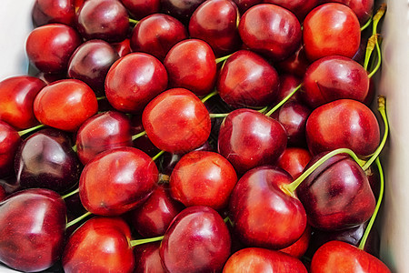 在盒子里闭紧红色樱桃饮食团体营养水果收成季节甜点农业花园植物图片