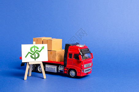 满载箱子的红色卡车 站着一个绿色的美元向上箭头 提高经济指标和销售额 出口进口 高贸易量 增长的生产 存储基础设施 中转交付图片