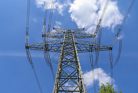 近视大电力铁塔的 将电力输送到活力发电机线路环境电源线框架车站天空电气高架图片