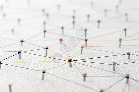 彩色纱线从钉节点到无的抽象网线连接全球网格金属商业世界技术营销数据社区互联网图片