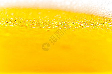 淡啤酒中气泡的质地啤酒墙纸运动艺术橙子酒吧饮料宏观泡泡玻璃图片