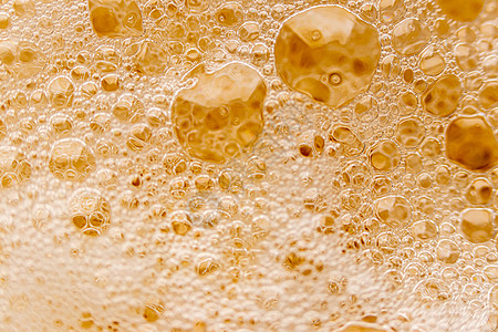淡啤酒中气泡的质地艺术玻璃运动酒吧气体反射泡沫泡泡墙纸液体图片