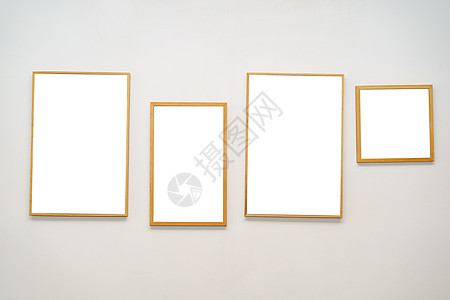 白墙上的木画框是空白的图片